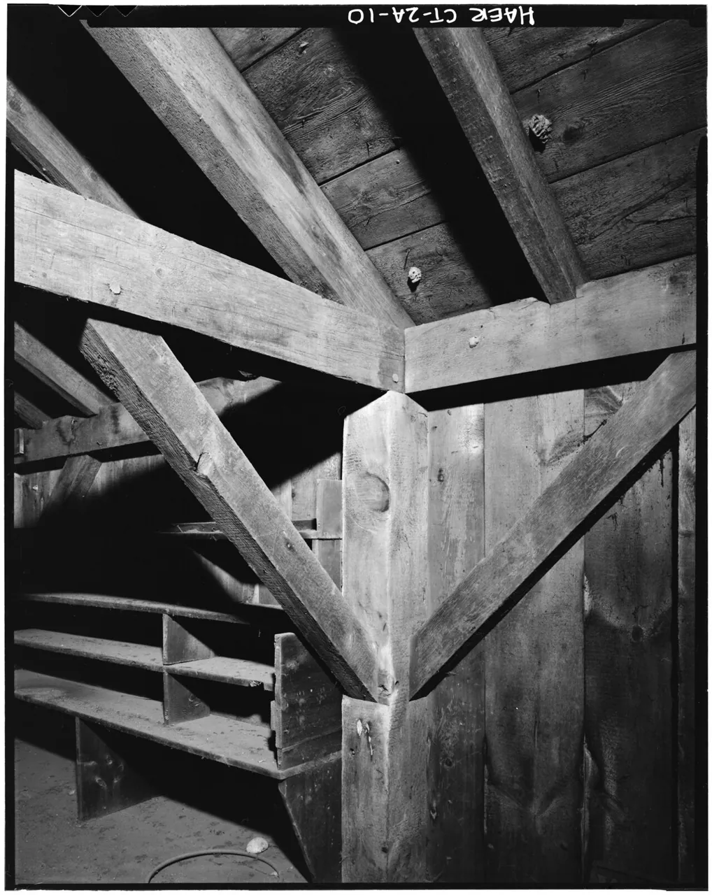 Barn timber-frame brace and stairs. 