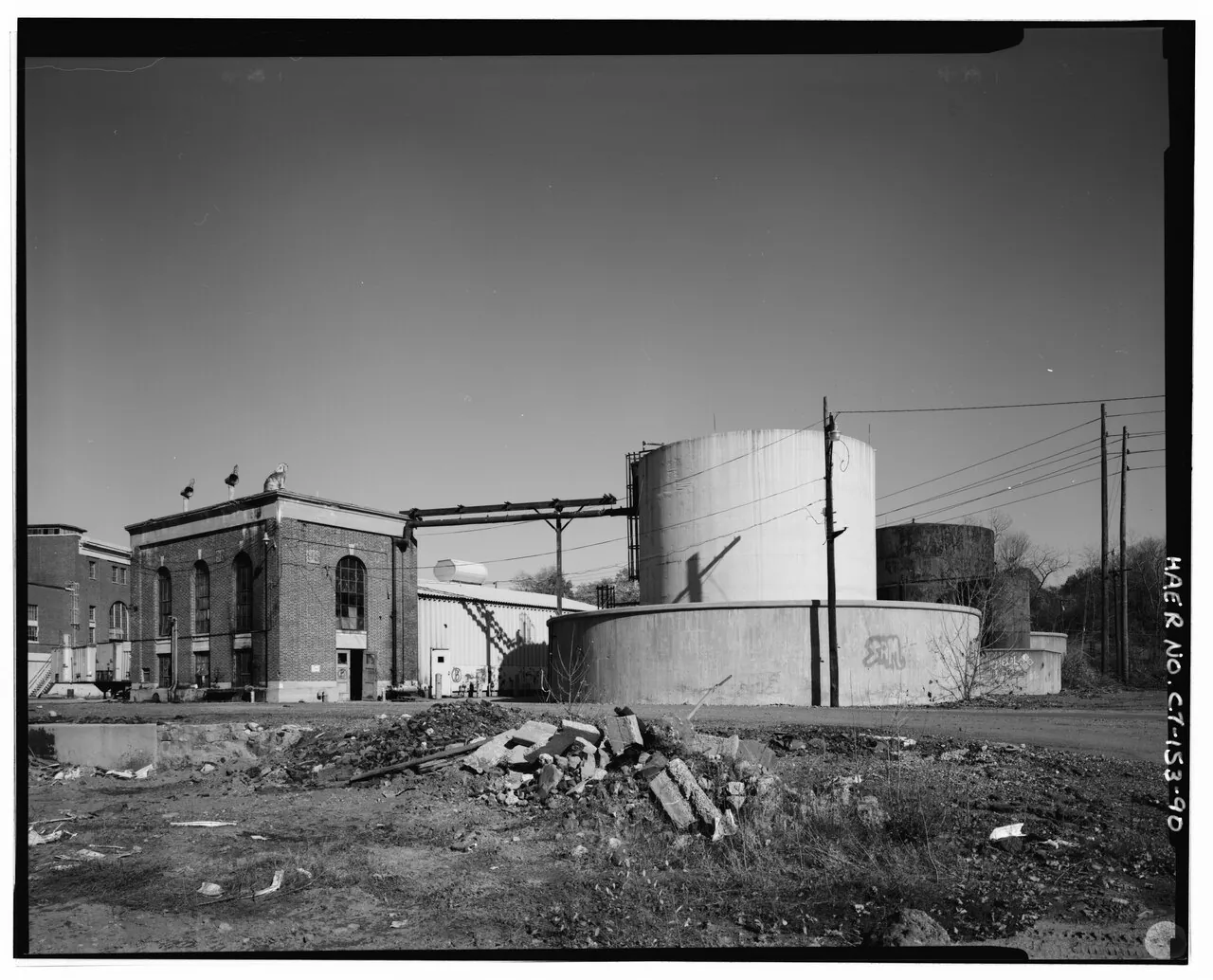 Scovill oil house and cylindrical storage tanks. 