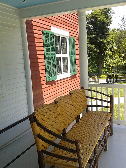 Weir Farm National Historic Site - Weir Farmhouse, bench on porch