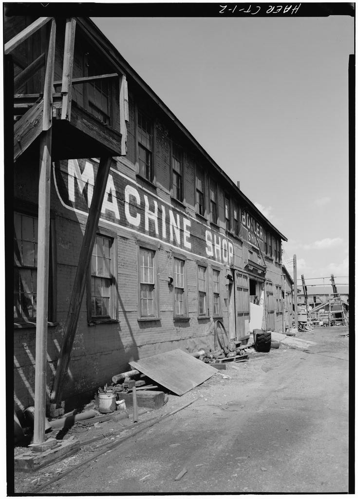 Left to right: Machine Shop and Boiler Works, east side; on right in distance--Pipe, Paint, and Electrical Shop