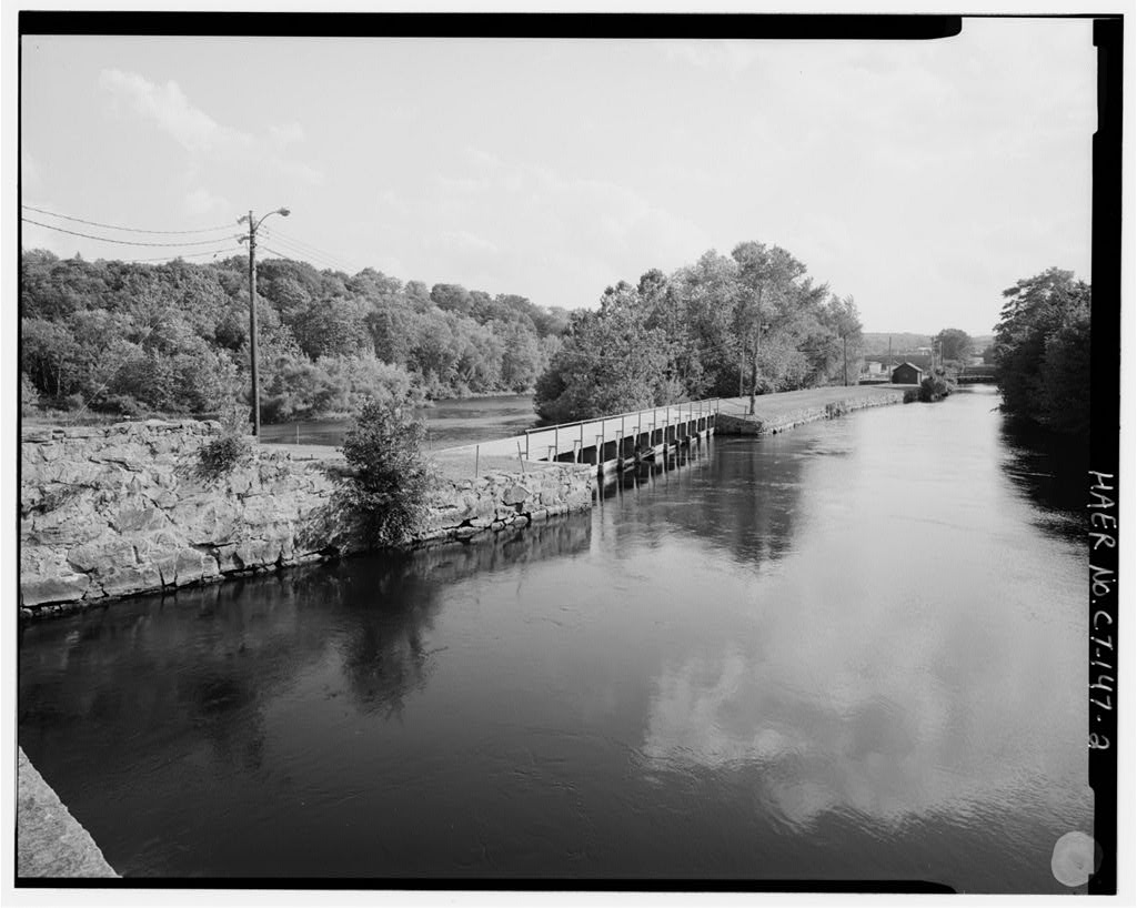 View south, general view showing canal, canal spillway on left, drain gate gatehouse in distance