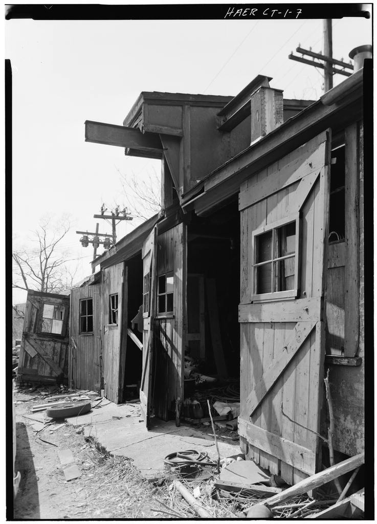 Hose House and Paint Storage, looking south along east side