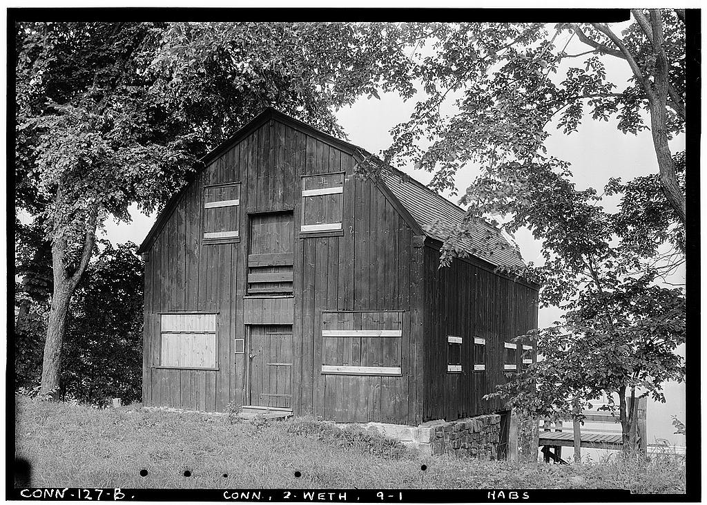 1.  Historic American Buildings Survey (Fed.) Stanley P. Mixon, Photographer July 29, 1940 (B) EXTERIOR GENERAL VIEW FROM SHORE (EAST) END - Old Warehouse, Wethersfield, Hartford County, CT · July 29, 1940