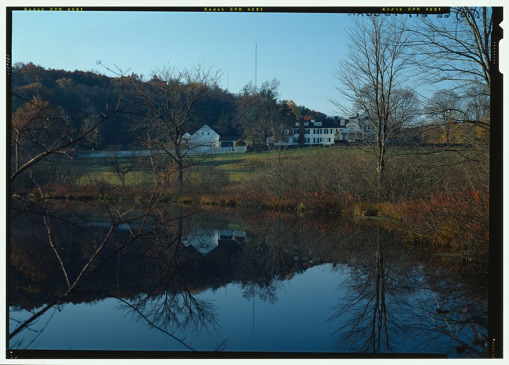 View of pond from north/northeast with Pope-Riddle house in background, in color. - Hill-Stead, 35 Mountain Road,…