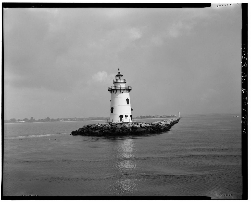 View looking northwest, showing Saybrook west breakwater and Lynde Point Lighthouse in the right background -…
