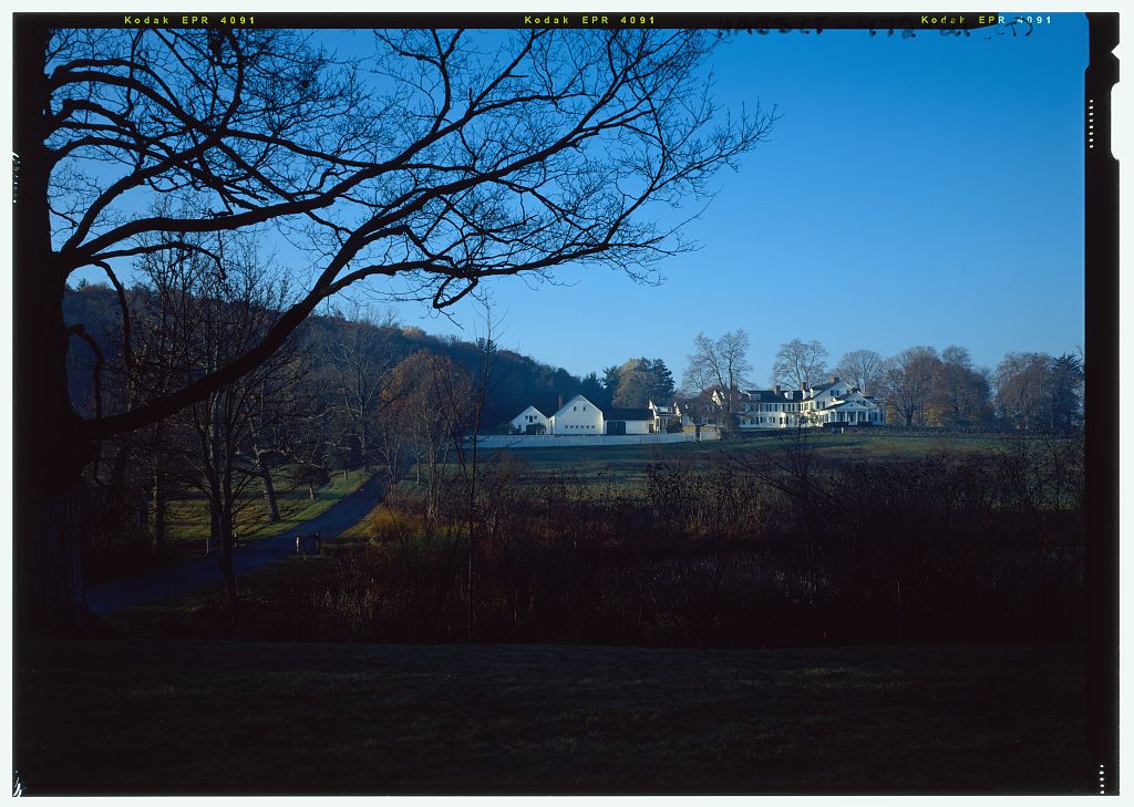 General view of Pope-Riddle house complex and landscape from east/northeast in color.  Note pond in foreground. -…