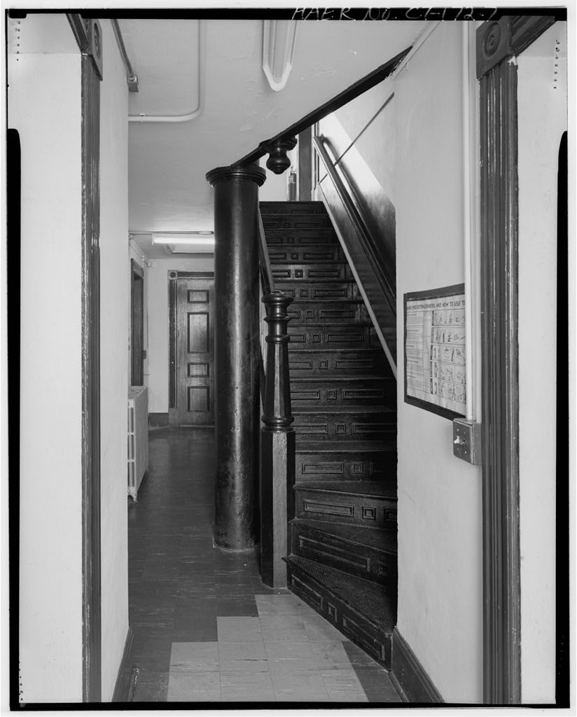 Staircase and hallway, first floor, looking southwest