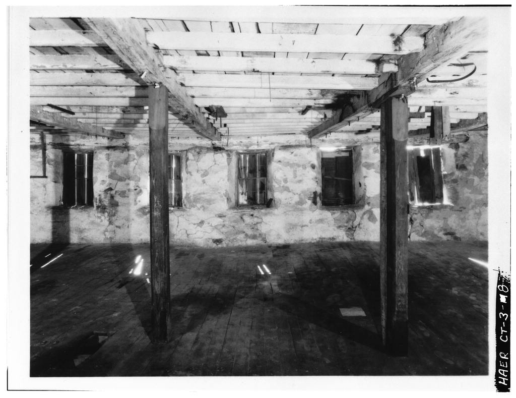 South wall, near southwest corner; looking south