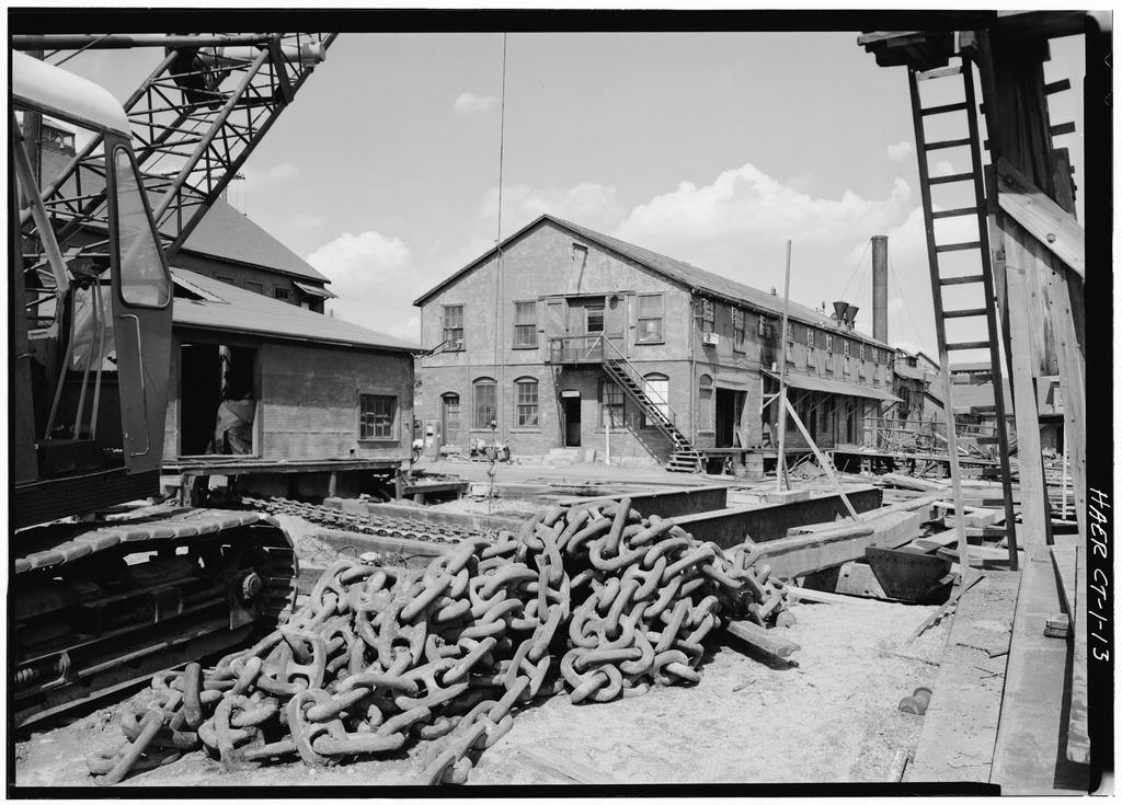 Steam powered Marine Railway Headhouse and Offices, center; chain is in front of electric powered Marine Railway…