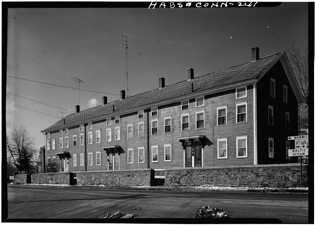 East (front) and north elevations of a typical section