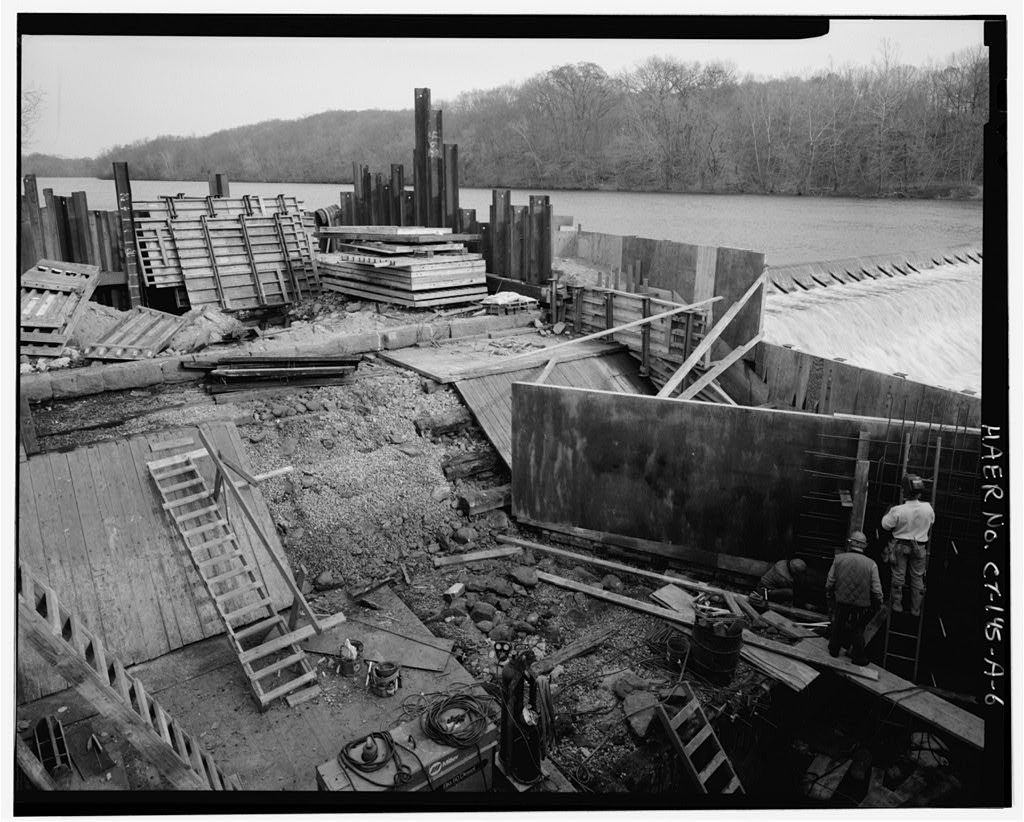 View northeast, west end of dam during construction of fishway, December 1995, showing removal of planking
